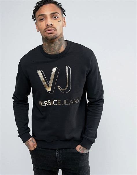 versace jeans sweatshirt in black with large foil logo